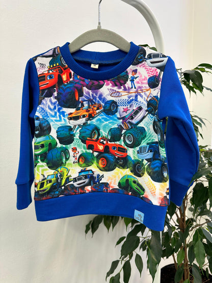 Blue sweater with cars